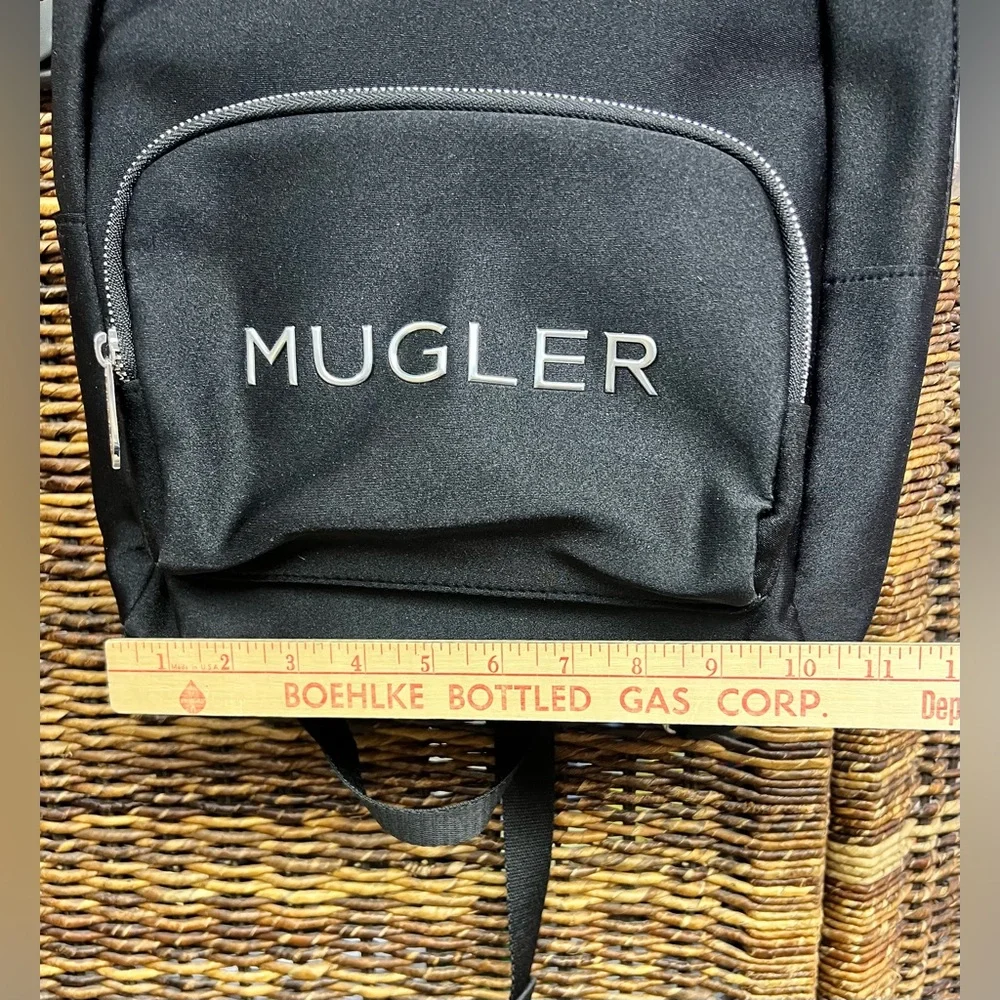 Mugler - Black Backpack- New, plastic over‎ two zippers, Apprx: 11”x13”